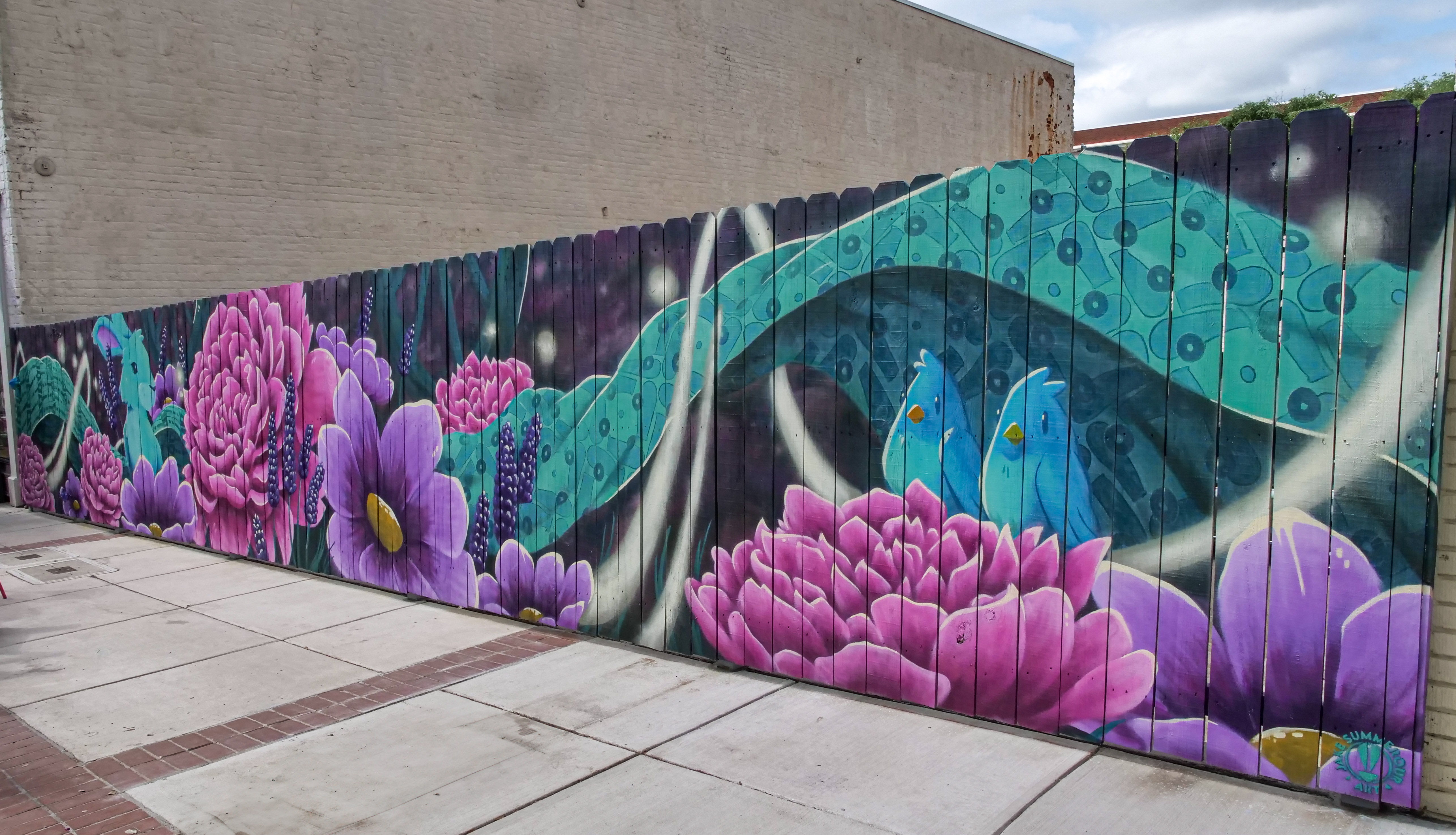 Picture of the full Mural located on the fence in Downtown Concord